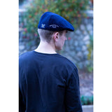 Officially Licensed U.S. Navy® 1775 Deluxe Edition Flat Cap Flat Cap by Poe & Company Limited | Poe and Company Limited, LLC®